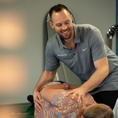 Chiropractor Springfield IL Samuel Oertel Adjusting Patient